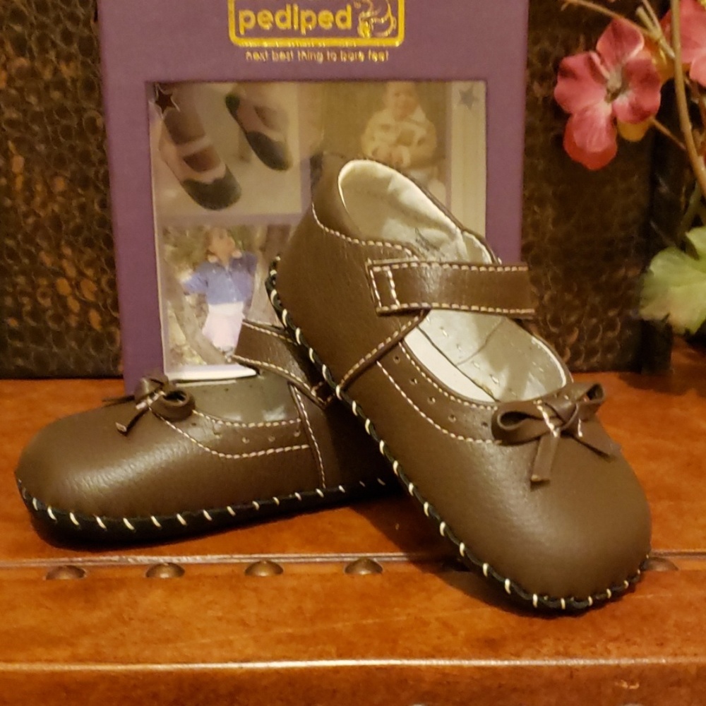 Hand made pepipeds,  brown in color